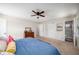Bedroom featuring a queen bed, closet and an ensuite bath at 117 Franklin Rd, Woodstock, GA 30188