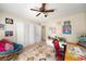 Bedroom featuring decoratively themed walls, carpet flooring and two closets for storage at 117 Franklin Rd, Woodstock, GA 30188