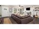 Bright living room featuring a fireplace, plenty of natural light, and stylish furnishings at 117 Franklin Rd, Woodstock, GA 30188