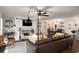 Cozy living area featuring a fireplace, modern lighting, and comfortable seating at 117 Franklin Rd, Woodstock, GA 30188