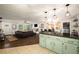 Open floor plan features a kitchen, dining area, and living room at 117 Franklin Rd, Woodstock, GA 30188
