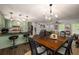Open concept living space with kitchen, dining area and living room at 117 Franklin Rd, Woodstock, GA 30188