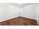 Bedroom featuring hard wood floors, closet, and window with blinds at 3575 Oakvale Rd # 301, Decatur, GA 30034
