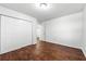 Bedroom features hard wood floors, closet, and white doors at 3575 Oakvale Rd # 301, Decatur, GA 30034