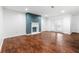 Spacious living room featuring beautiful hardwood floors and a cozy fireplace at 3575 Oakvale Rd # 301, Decatur, GA 30034