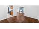 Open floor plan with hardwood floors connects living room and kitchen at 3575 Oakvale Rd # 301, Decatur, GA 30034