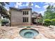 Backyard view of spa and pool with outdoor kitchen at 4105 Cougar Ne Pt, Marietta, GA 30066