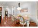 Bright dining room features hardwood floors and a decorative chandelier at 4105 Cougar Ne Pt, Marietta, GA 30066