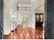 An elegant two-story foyer features hardwood floors, soaring ceilings, and an open staircase, creating a grand entrance at 4105 Cougar Ne Pt, Marietta, GA 30066