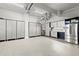 Spacious garage features custom cabinets, stainless steel fridge, and organized storage solutions at 4105 Cougar Ne Pt, Marietta, GA 30066