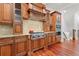 Close up on the kitchen showing the range, hood and beautiful cabinetry at 4105 Cougar Ne Pt, Marietta, GA 30066