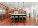 Gourmet kitchen with a large island, stainless appliances, and hardwood floors at 4105 Cougar Ne Pt, Marietta, GA 30066