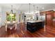 Open gourmet kitchen has custom cabinets, a center island, and stainless appliances at 4105 Cougar Ne Pt, Marietta, GA 30066