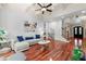 Elegant living room boasts tray ceilings, hardwood floors and beautiful staircase at 4105 Cougar Ne Pt, Marietta, GA 30066