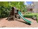 Backyard playground featuring a slide and climbing structure for active play at 4105 Cougar Ne Pt, Marietta, GA 30066