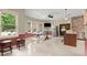 Spacious recreation room with a ping pong table, TV, and a view to the backyard at 4105 Cougar Ne Pt, Marietta, GA 30066