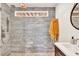 Modern bathroom features a glass-enclosed shower with contemporary fixtures at 1253 Rivermark Ct, Lawrenceville, GA 30043
