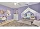 Stylish bedroom with a desk, chair and recessed sleeping area, creating a relaxing space at 1253 Rivermark Ct, Lawrenceville, GA 30043