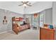 Inviting bedroom featuring a bunk bed and a view of the outside at 1253 Rivermark Ct, Lawrenceville, GA 30043