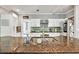 Stylish kitchen featuring granite countertops, stainless steel appliances, white cabinetry, and a subway tile backsplash at 1253 Rivermark Ct, Lawrenceville, GA 30043