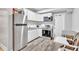 Efficient kitchen features stainless steel appliances and plenty of storage at 1253 Rivermark Ct, Lawrenceville, GA 30043