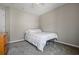 The bedroom has neutral colors and carpet at 186 Wallnut Hall Cir, Woodstock, GA 30189