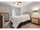 Bedroom features carpet, neutral colors, and natural light at 186 Wallnut Hall Cir, Woodstock, GA 30189