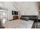 Spacious living room featuring a fireplace, tall windows, and an open concept at 186 Wallnut Hall Cir, Woodstock, GA 30189