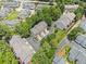 Aerial view showcases the neighborhood's dense trees, well manicured lawns, and convenient street layout at 1251 Brickton Nw Dr, Atlanta, GA 30318