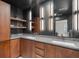 Modern bathroom with a double sink vanity, lots of cabinet space, and stylish lighting at 1251 Brickton Nw Dr, Atlanta, GA 30318