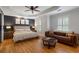 Spacious main bedroom with hardwood floors, natural light, and a sitting area at 1251 Brickton Nw Dr, Atlanta, GA 30318