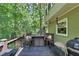 Relaxing outdoor deck area with seating, and grilling equipment at 3535 Fairgreen Ct, Douglasville, GA 30135