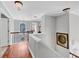 Open hallway featuring hardwood floors, neutral paint, and wood railings at 3535 Fairgreen Ct, Douglasville, GA 30135