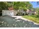 Charming single-story home with attached garage and well-maintained lawn and shade trees at 4234 Long Branch Ct, Brookhaven, GA 30319