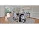 Dining room with hardwood floors and direct access to the other living spaces at 750 Park Ne Ave # 6E, Atlanta, GA 30326