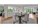 Open dining room featuring hardwood floors and views of the kitchen and living spaces at 750 Park Ne Ave # 6E, Atlanta, GA 30326