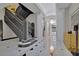Luxury entrance hall featuring elegant stairs and marble floors at 750 Park Ne Ave # 6E, Atlanta, GA 30326