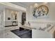 Elegant living room with a large painting, stylish furniture and decor at 750 Park Ne Ave # 6E, Atlanta, GA 30326