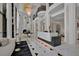 Grand lobby with marble floors, stylish seating, and a chandelier at 750 Park Ne Ave # 6E, Atlanta, GA 30326