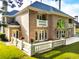 Spacious brick home backyard with manicured lawn, perfect for outdoor entertaining and relaxation at 8370 Royal Melbourne Way, Duluth, GA 30097