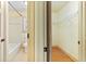 Bathroom with tiled shower, and a walk in closet with wire shelving at 8370 Royal Melbourne Way, Duluth, GA 30097