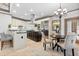 Eat-in kitchen with stainless appliances, island, and breakfast bar at 8370 Royal Melbourne Way, Duluth, GA 30097