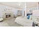 Serene main bedroom features a cozy fireplace and stylish decor for ultimate relaxation at 8370 Royal Melbourne Way, Duluth, GA 30097