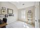 Cozy bedroom featuring natural light, crown molding and simple decor at 11259 Calypso Dr, Alpharetta, GA 30009