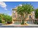 Charming brick townhome with well-manicured landscaping, a two-car garage, and a welcoming entrance at 11259 Calypso Dr, Alpharetta, GA 30009