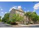 Charming brick townhouse with attached two car garage and manicured landscaping at 11259 Calypso Dr, Alpharetta, GA 30009