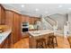 Spacious kitchen with center island, stainless appliances, and plenty of cabinet space at 11259 Calypso Dr, Alpharetta, GA 30009