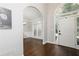 Foyer with hardwood floors that leads to a dining room with bright natural light at 1418 Winborn Nw Cir, Kennesaw, GA 30152