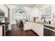 Bright eat-in kitchen with stainless appliances, granite countertops, a breakfast nook and hardwood floors at 1418 Winborn Nw Cir, Kennesaw, GA 30152