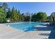 A beautiful, large swimming pool with lounge chairs provides a relaxing outdoor experience at 1418 Winborn Nw Cir, Kennesaw, GA 30152